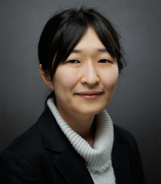 Headshot of Tomoko Takahashi.
