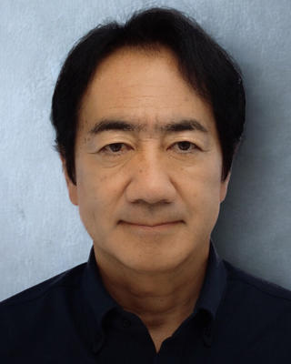 Headshot of Yutaka Yamaguchi.