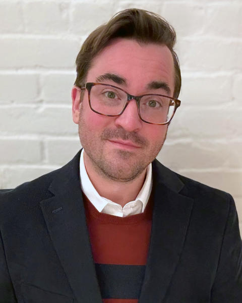 Headshot of Colin Moreshead.