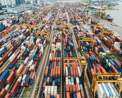 Aerial view of shipping containers on a dock.